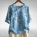 Blue Charlotte Breezy Leaf Print Blouse by Lumina Wear with button-up design, featuring a relaxed, lightweight fabric.