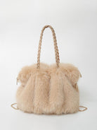 Luxurious plush velvet tote bag by Lumina Wear, spacious design, elegant brown handbag with stylish handles and detailed stitching.