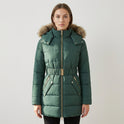 Green Charlotte quilted puffer jacket with faux-fur hood from Lumina Wear, showing the jacket's padded design and fur-lined hood.