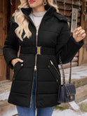 Lumina Wear Charlotte quilted puffer jacket with faux-fur hood in green, displayed on a hanger, showing its quilted design and cozy style.