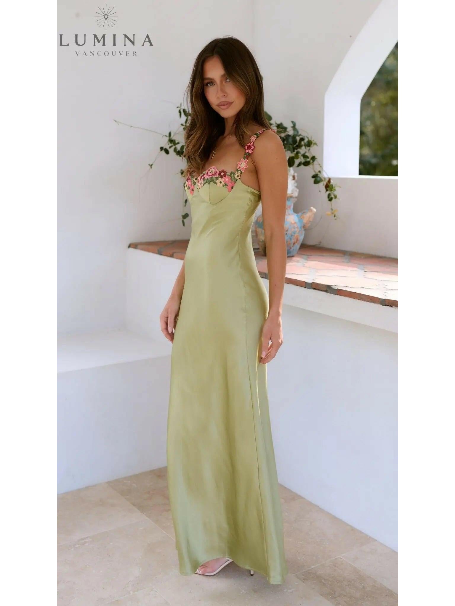 Lime green Chelsey maxi dress with flower details, designed for wedding guests, by Lumina Vancouver.