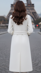 Long white coat by Lumina Vancouver, featuring a chic design, tailored fit, and soft fabric for stylish winter wear.