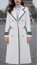 Long white coat by Lumina Wear featuring a chic design, perfect for stylish winter or fall outfits.
