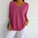 Dark gray Lumina Wear Clara relaxed V-neck sweater with minimalist design, perfect for women’s casual wear.