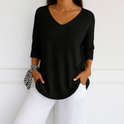 Dark gray Lumina Wear Clara relaxed V-neck sweater with minimalist design, casual fit, perfect for women.