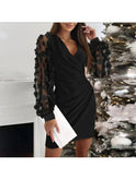 Black Cristina elegant sleeve wrap dress by Lumina Wear featuring pearl sleeves, styled for a sophisticated look.