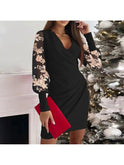 Black Cristina elegant sleeve wrap dress by Lumina Wear, featuring pearl sleeves and a flattering fit, perfect for stylish occasions.