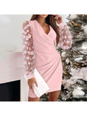 Black Cristina elegant sleeve wrap dress by Lumina Wear with pearl sleeves, showcased on a model.