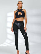 Black Cross Super Lift Sports Bra by Lumina Vancouver featuring a supportive design for active wear and exercise.