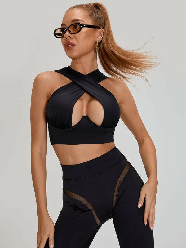 Black Cross Super Lift Sports Bra by Lumina Vancouver, featuring supportive cross straps and athletic design for active wear.