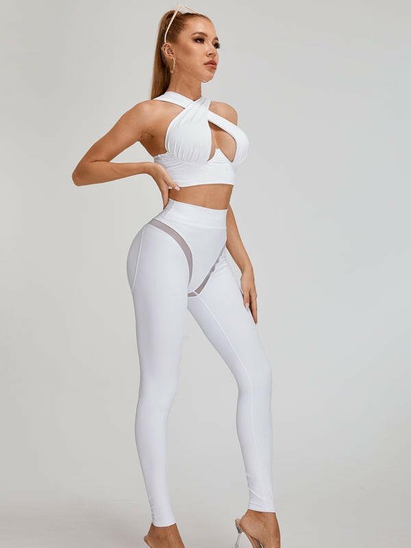 White Cross Super Lift Sports Bras by Lumina Vancouver, showcasing supportive design and cross-straps for active wear.