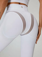 White Lumina Vancouver Cross Super Lift Sports Bra with supportive cross design, ideal for active workouts.