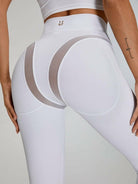White Cross Super Lift sports bra by Lumina Vancouver, designed for support and comfort during active workouts.