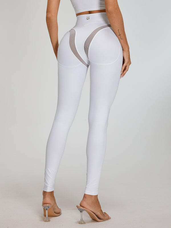 White Cross Super Lift sports bra by Lumina Vancouver, with supportive design and breathable fabric for active wear.