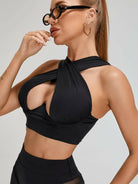 White Cross Super Lift sports bra by Lumina Vancouver with supportive cross straps, designed for active wear and workout comfort.