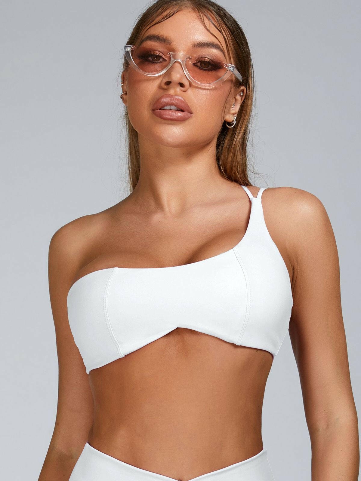Pink Lumina Vancouver Cutout Tailoring Sports Bra with stylish design and supportive fit for active wear.