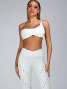Pink Lumina Vancouver sports bra with cutout tailoring design, featuring a supportive fit and stylish athletic look.