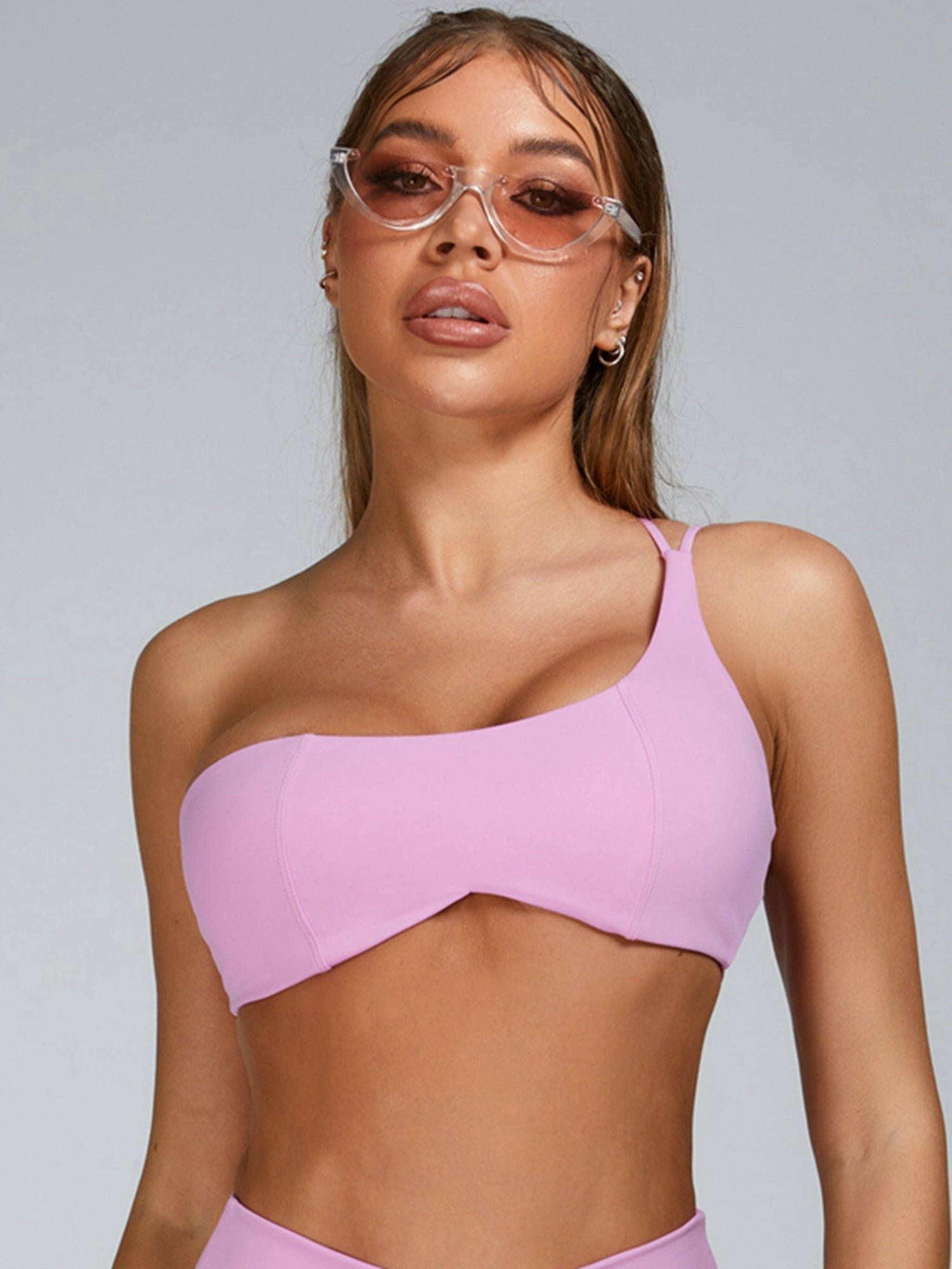 Pink Lumina Vancouver sports bra with stylish cutout tailoring, designed for support and comfort during workouts.