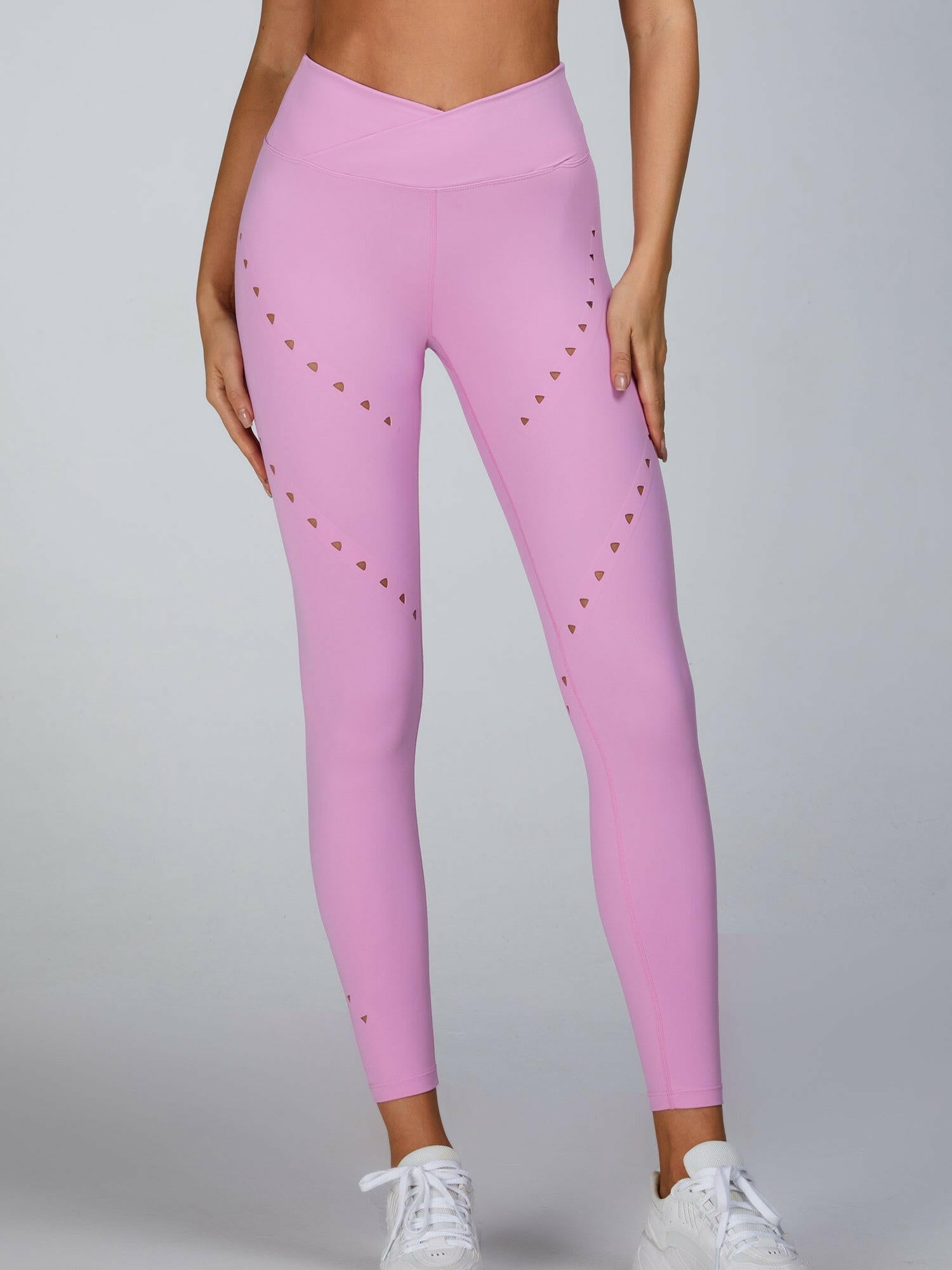 Pink Lumina Vancouver sports bra with cutout tailoring and supportive design, ideal for active workouts and athletic wear.