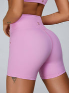 Pink Lumina Vancouver sports bra with cutout tailoring and supportive design, ideal for activewear and workouts.