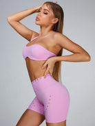 Pink Lumina Vancouver cutout tailoring sports bra with stylish design and supportive fit, ideal for active wear and workouts.