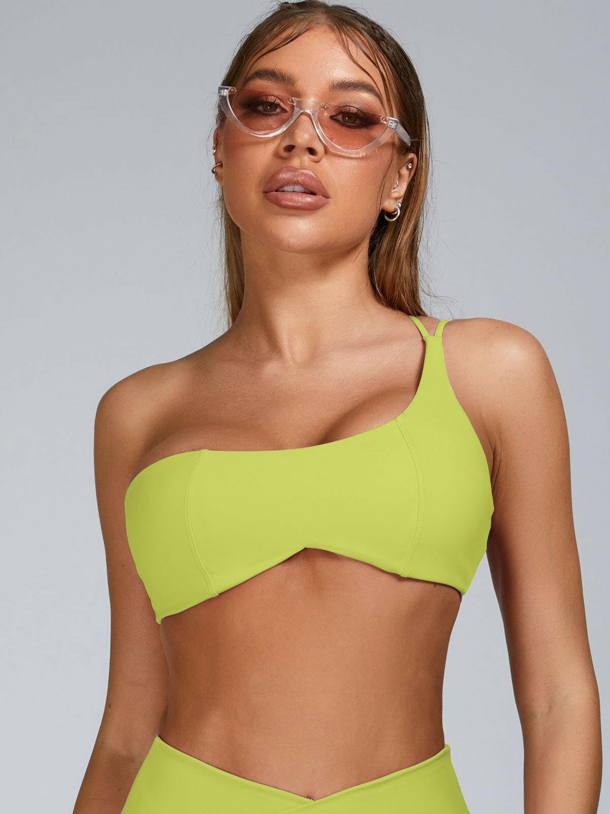 Pink Lumina Vancouver cutout tailoring sports bra with stylish design and supportive fit for active wear.