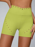 Pink Lumina Vancouver cutout tailoring sports bra featuring stylish cutout design and supportive fit for active wear.