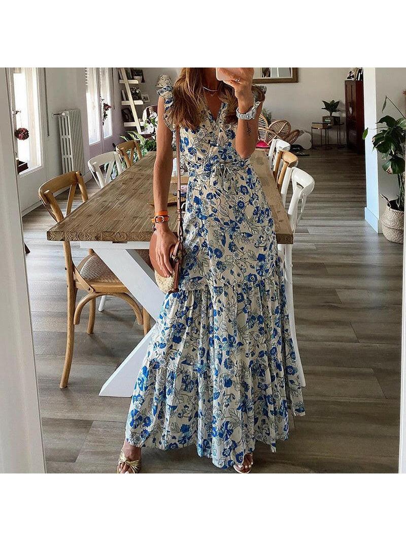 Blue Dahlia™ floral maxi dress by Lumina Vancouver, flowing design with vibrant floral patterns, perfect for summer occasions.