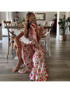 Blue Dahlia™ floral maxi dress by Lumina Vancouver, flowing design with vibrant print, perfect for elegant summer occasions.