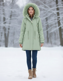 Daisy Lumina Wear cozy faux-fur lined parka coat in tangerine with adjustable fit, shown in XS size.