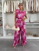 Elegant black pleated two-piece set by Lumina Wear, featuring a flattering fit and stylish design for versatile fashion.