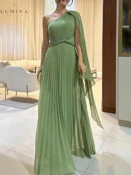 Yellow off-shoulder pleated maxi dress by Lumina Wear, elegant evening dress suitable for weddings and formal occasions.