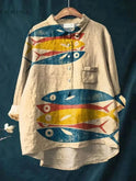 Lumina Wear Dana Fish Print T-Shirt featuring a colorful fish design on a casual crew neck tee.