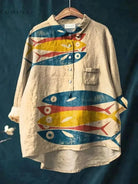 Dana Fish Print T-shirt by Lumina Vancouver, featuring a vibrant fish design on a casual tee, displayed on a white background.