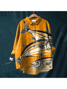 Dana Fish Print Tee by Lumina Vancouver featuring a colorful fish illustration on a casual white cotton t-shirt.