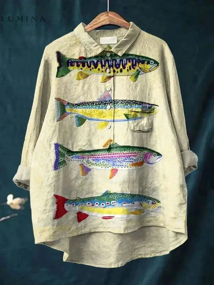 Dana Fish Print Tee by Lumina Vancouver, featuring a colorful fish print on a casual cotton T-shirt for women.