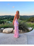 Pink Darcel sleeveless long dress by Lumina Vancouver, perfect for wedding guest attire, shown on a model.