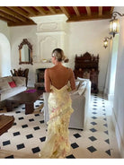 Pink Darcel sleeveless long dress by Lumina Vancouver, perfect for wedding guests, showcased on a model.
