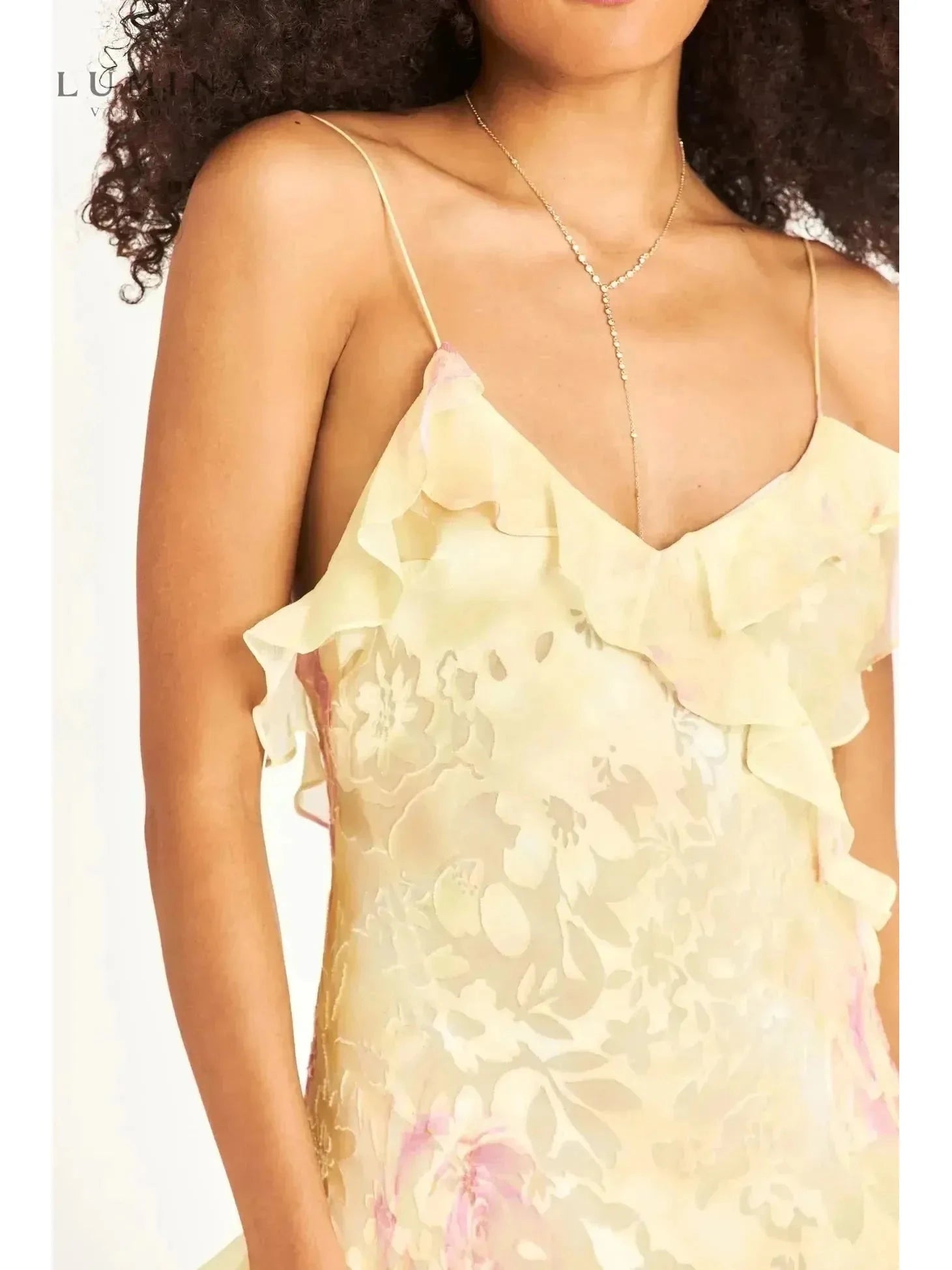 Pink Darcel sleeveless long wedding guest dress by Lumina Vancouver, displayed on a model with flowing fabric and elegant design.