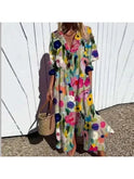 Colorful boho maxi dress by Lumina Wear featuring a vibrant pattern, flowing fabric, and relaxed fit perfect for casual wear.