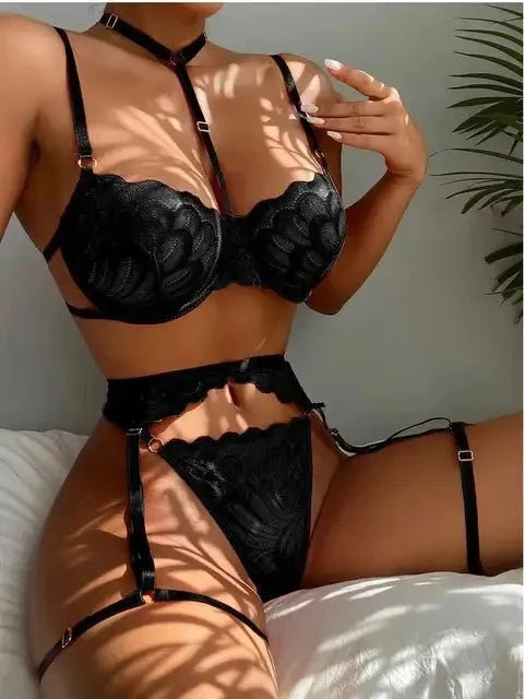 Black Devon 3-piece French lingerie set by Lumina Vancouver, featuring lace bra, matching panties, and garter belt.