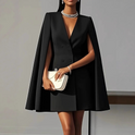 Elara Lumina Wear double-breasted cape mini dress in apricot, stylish short dress with a cape detail, showcased on a model.