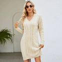 Navy blue Lumina Wear Elara knit mini dress with slim fit and V-neck, showcased on a model against a plain background.