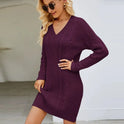 Navy blue Elara knit mini dress by Lumina Wear featuring a slim fit and V-neck, displayed on a plain background.