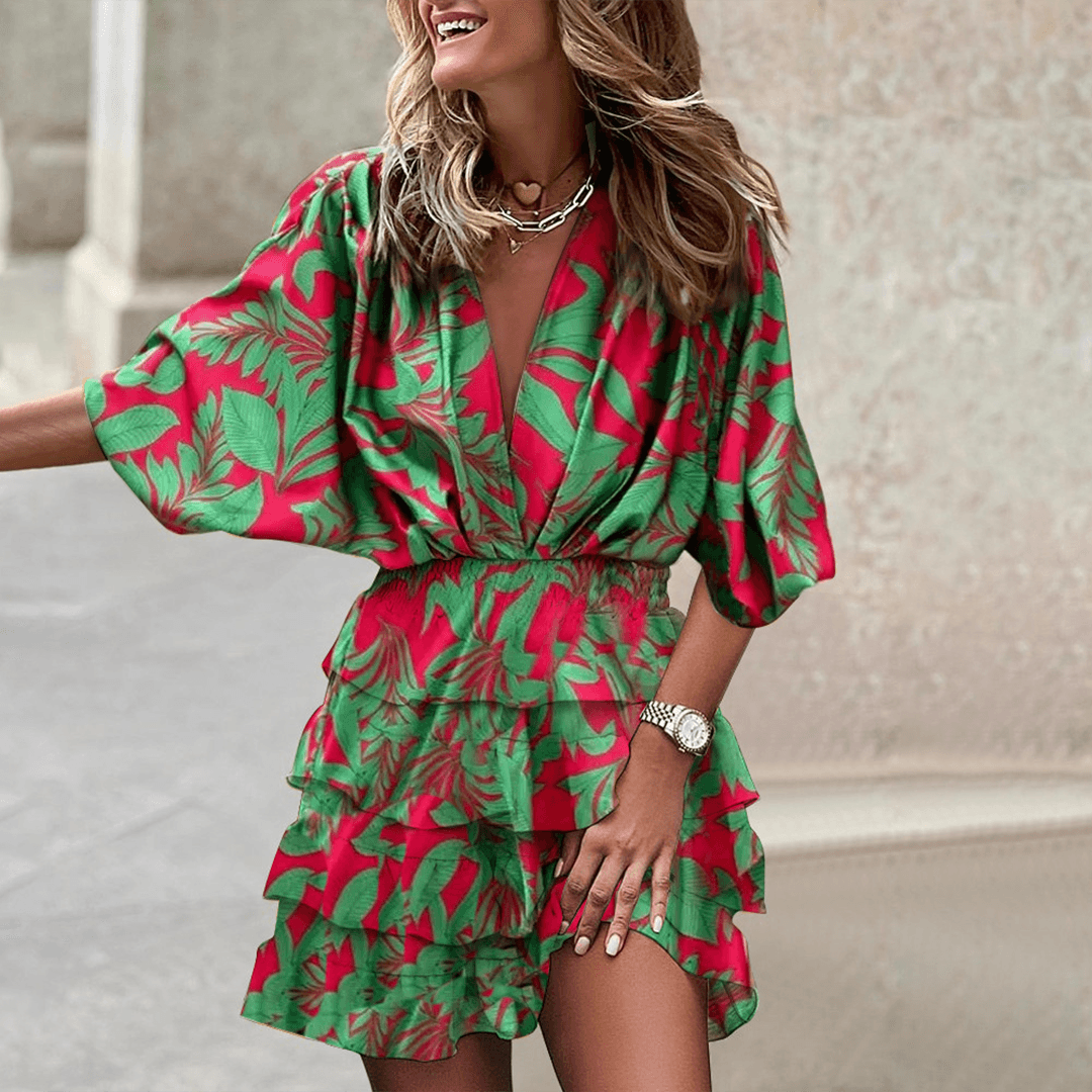 Blue Liv Romper V-Neck with smocked waist, Lumina Vancouver mini dress, lightweight and stylish for casual wear.