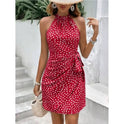 Red Lumina Wear Elara short dress with halter neck and wrap design, showcasing a stylish mini dress with a fitted silhouette.