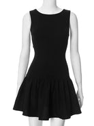 Black sleeveless A-line mini dress by Lumina Vancouver, featuring a fitted bodice and flared skirt, perfect for casual or elegant wear.