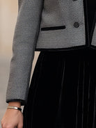 Elegant Lumina Vancouver cropped jacket with black velvet trim, featuring a stylish design and fitted silhouette.