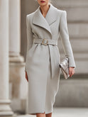 Light grey Lumina Wear belted wool midi coat featuring a classic design and tailored fit, displayed on a model.