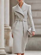 Light grey Lumina Vancouver belted wool midi coat with structured silhouette and classic collar, displayed on a mannequin.